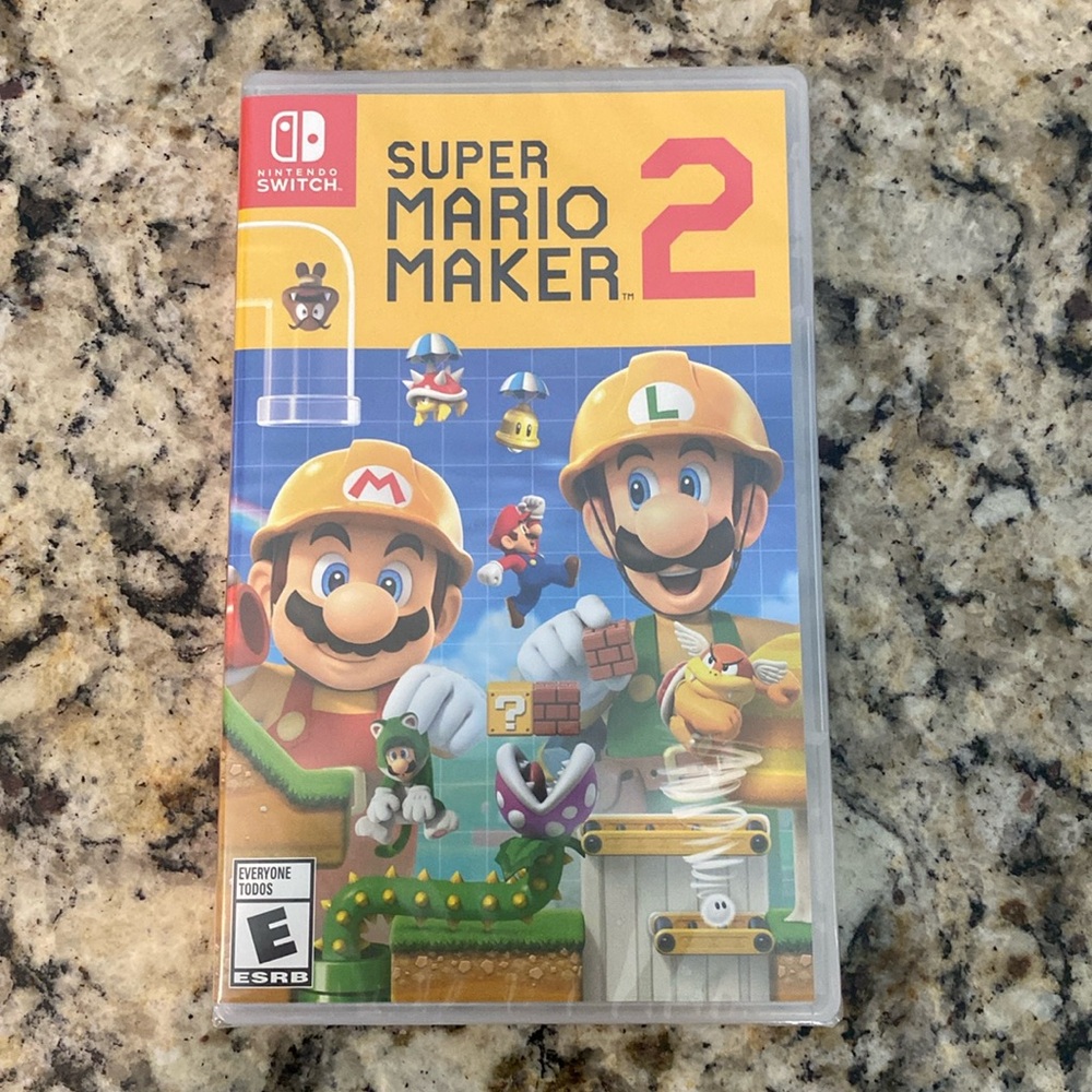 Nintendo Super Mario Maker 2 Video Game with Yellow Cover Art